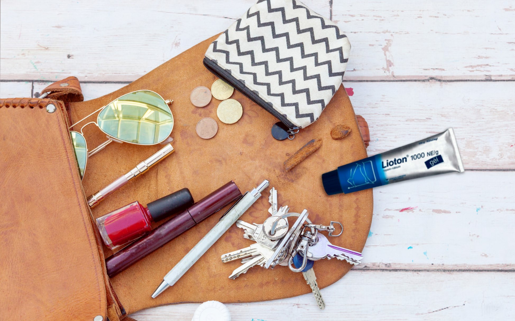 ჩანთაში დევს ლიოტონი®1000 გელი ჰემატომების სამკურნალოდ